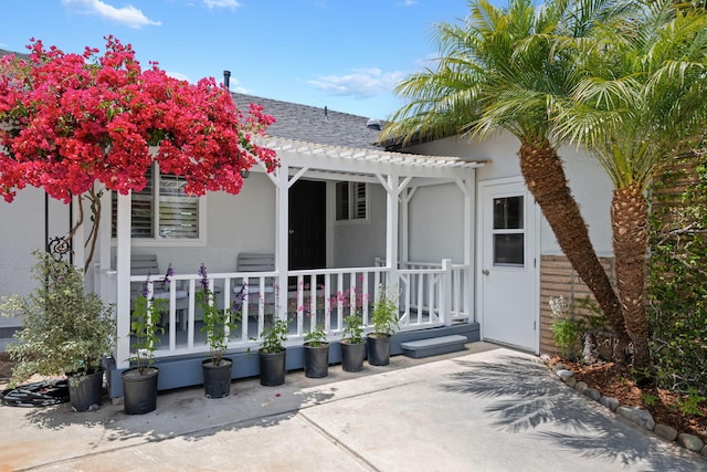 7659 Dartmoor Ave, Goleta, CA 93117 - back of property with a pergola, covered porch, stucco siding, and roof with shingles