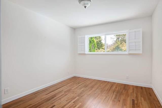 7659 Dartmoor Ave, Goleta, CA 93117 - unfurnished room with baseboards and light wood finished floors