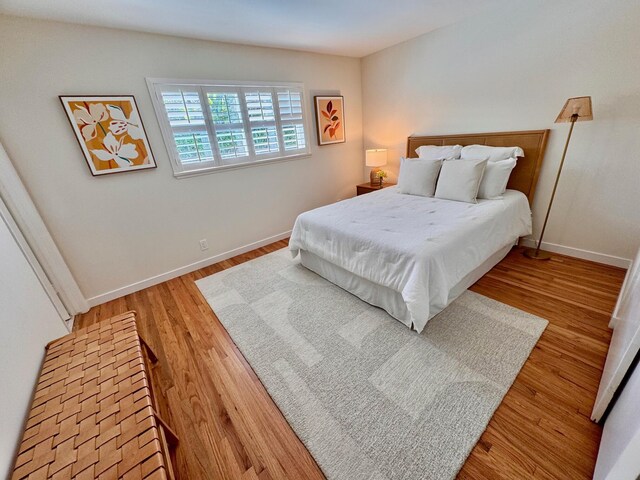 7659 Dartmoor Ave, Goleta, CA 93117 - bedroom with wood finished floors and baseboards