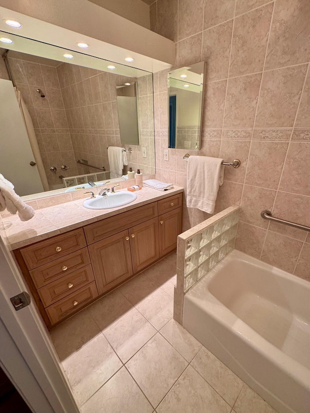 7659 Dartmoor Ave, Goleta, CA 93117 - full bathroom featuring tile walls, tile patterned floors, vanity, and shower / washtub combination