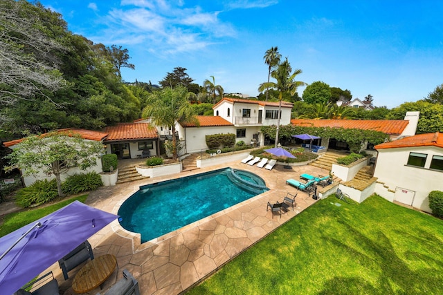 1151 Glenview Rd, Montecito, CA 93108 - view of swimming pool featuring a patio, a yard, stairs, and a pool with connected hot tub