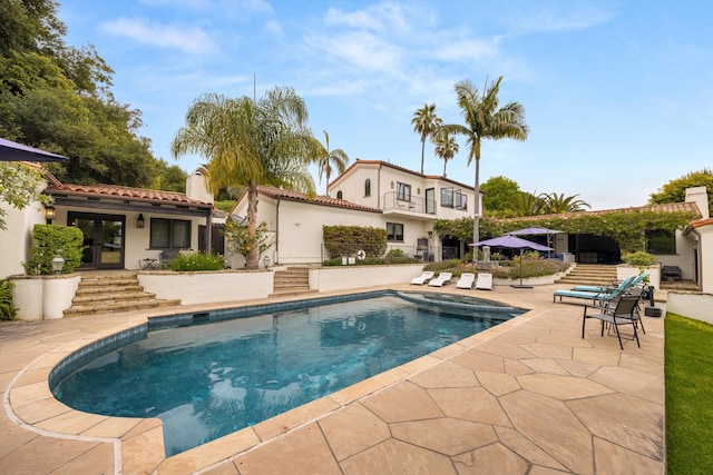1151 Glenview Rd, Montecito, CA 93108 - view of pool featuring french doors, a patio area, and a pool with connected hot tub