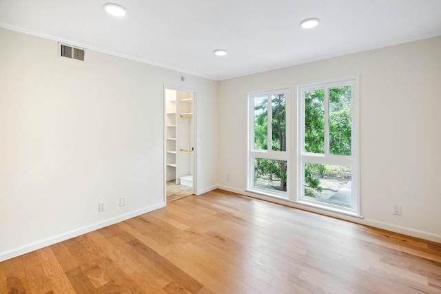2624 State St # 1, Santa Barbara, CA 93105 - unfurnished room with light wood-type flooring, crown molding, and recessed lighting