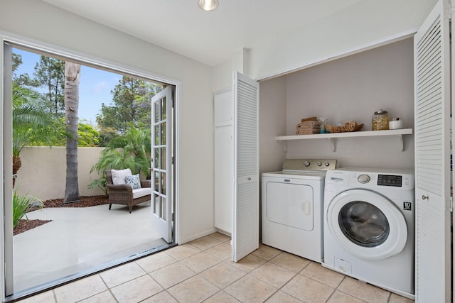 3773 Greggory Way Unit 2, Santa Barbara, CA 93105 - laundry room with washer and dryer and light tile patterned floors