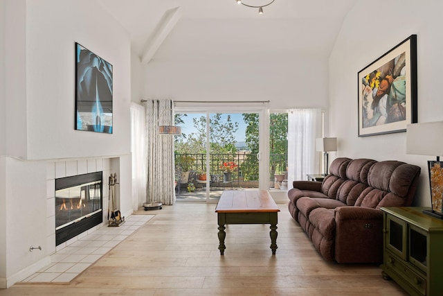 5965 Paseo Encantada, Camarillo, CA 93012 - living room with high vaulted ceiling, a fireplace, light wood-type flooring, and beam ceiling