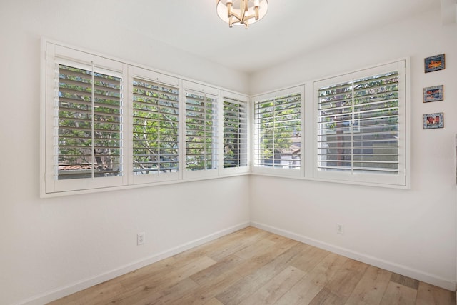 5965 Paseo Encantada, Camarillo, CA 93012 - spare room featuring baseboards and wood-type flooring