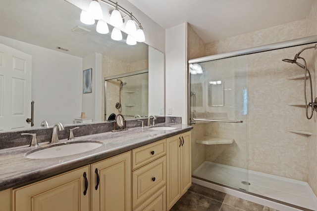 5965 Paseo Encantada, Camarillo, CA 93012 - bathroom featuring a stall shower, double vanity, and tile patterned flooring