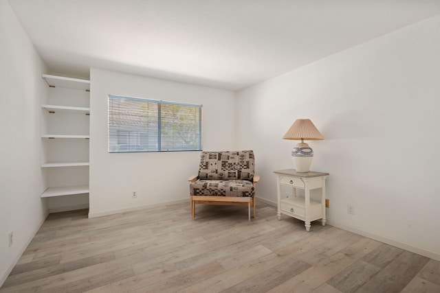 5965 Paseo Encantada, Camarillo, CA 93012 - sitting room with light wood-style floors and baseboards