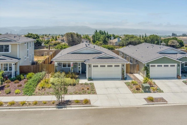 150 White Sage Ln, Lompoc, CA 93436 - single story home with driveway, a residential view, a garage, and a mountain view