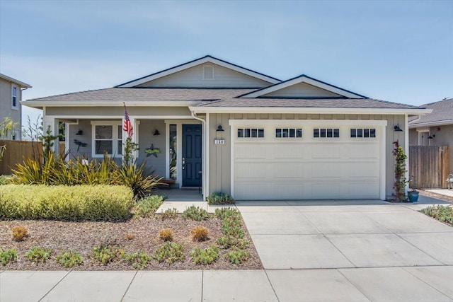 150 White Sage Ln, Lompoc, CA 93436 - single story home featuring a garage, concrete driveway, a shingled roof, and covered porch