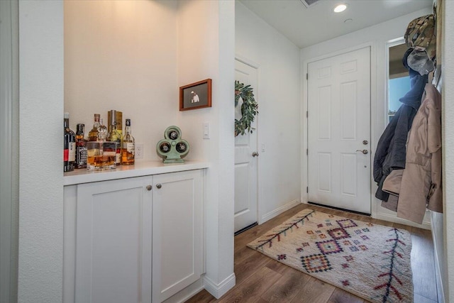 150 White Sage Ln, Lompoc, CA 93436 - entrance foyer featuring wood finished floors, a bar, and recessed lighting