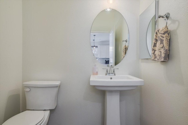 150 White Sage Ln, Lompoc, CA 93436 - half bathroom featuring toilet and a sink