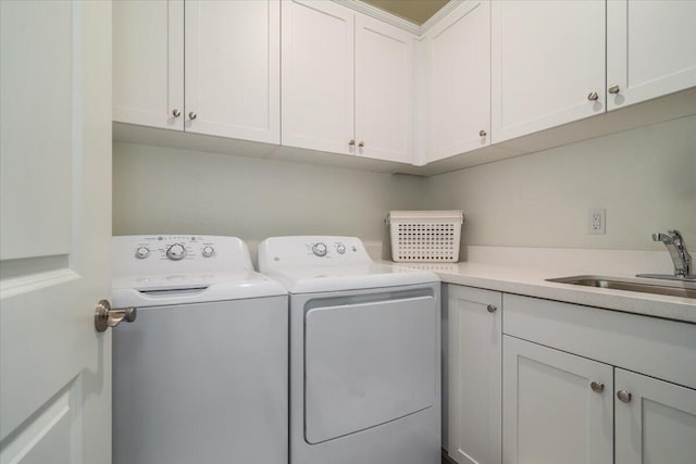150 White Sage Ln, Lompoc, CA 93436 - laundry area featuring separate washer and dryer and cabinet space