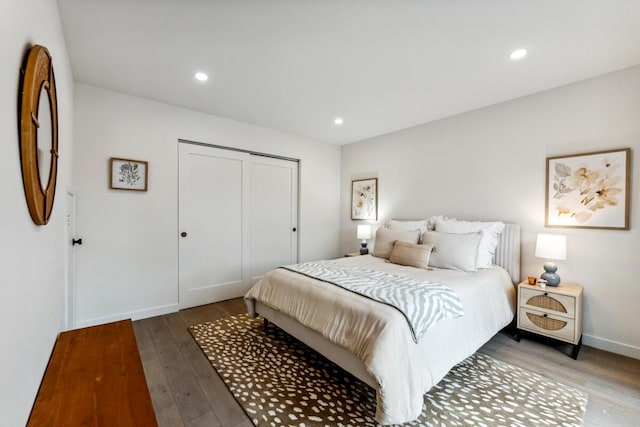730 Meigs Rd, Santa Barbara, CA 93109 - bedroom with hardwood / wood-style floors, a closet, recessed lighting, and baseboards