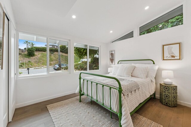 730 Meigs Rd, Santa Barbara, CA 93109 - bedroom featuring baseboards, wood-type flooring, lofted ceiling, and recessed lighting
