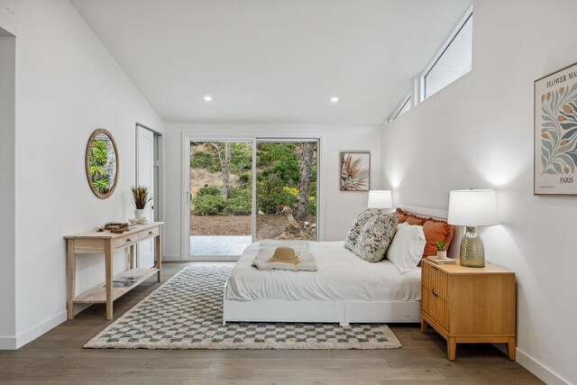 730 Meigs Rd, Santa Barbara, CA 93109 - bedroom featuring access to outside, wood finished floors, high vaulted ceiling, recessed lighting, and baseboards