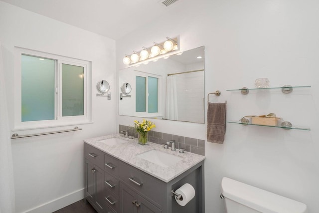 530 Ricardo Ave, Santa Barbara, CA 93109 - bathroom with toilet, double vanity, and a shower with curtain