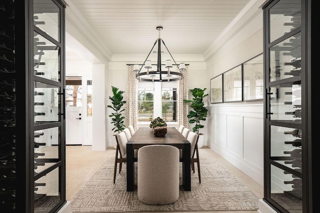 120 Polo Way, Carpinteria, CA 93013 - dining room featuring a chandelier, ornamental molding, and a decorative wall