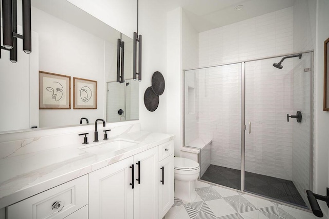 120 Polo Way, Carpinteria, CA 93013 - full bathroom with toilet, vanity, a stall shower, and tile patterned floors