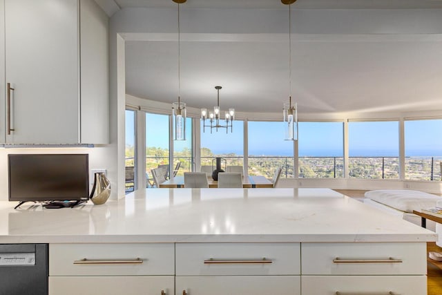 128 Las Alturas Rd, Santa Barbara, CA 93103 - kitchen with dishwasher, healthy amount of natural light, white cabinetry, and light stone counters