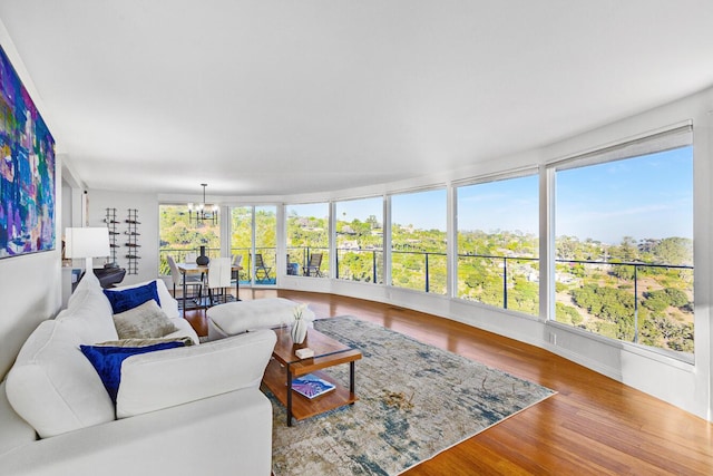 128 Las Alturas Rd, Santa Barbara, CA 93103 - living room featuring a chandelier and wood finished floors