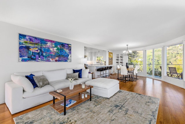 128 Las Alturas Rd, Santa Barbara, CA 93103 - living area featuring a chandelier and wood finished floors