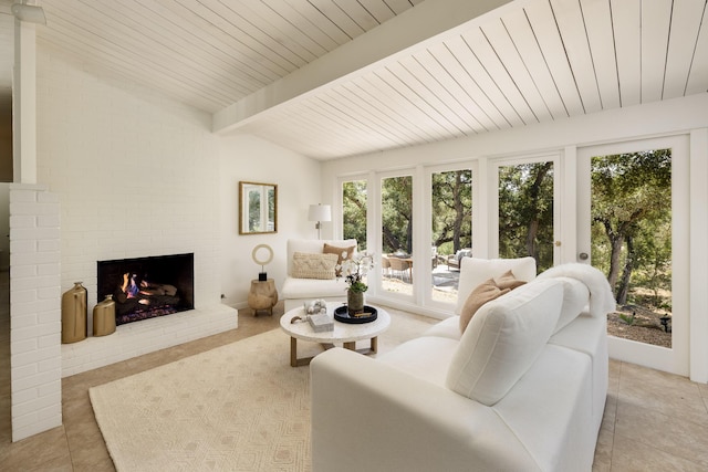 1067 E Mountain Dr, Santa Barbara, CA 93108 - living area featuring a brick fireplace, light tile patterned flooring, and wooden ceiling