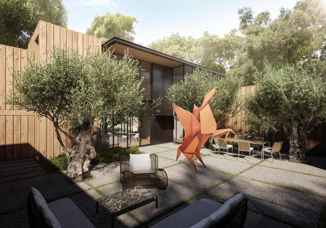 1067 E Mountain Dr, Santa Barbara, CA 93108 - fenced backyard with a patio and outdoor dining space