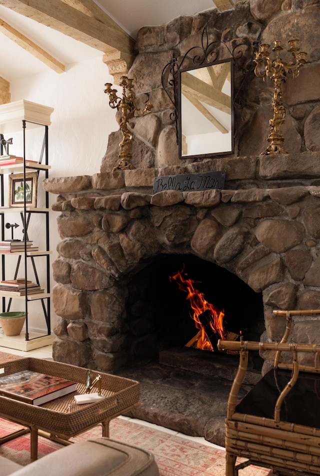 15 Loma Media Rd, Santa Barbara, CA 93103 - detailed view of a stone fireplace and beamed ceiling
