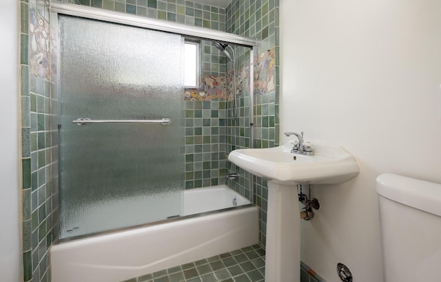 5003 Rhoads Ave, Santa Barbara, CA 93111 - bathroom featuring combined bath / shower with glass door and tile patterned flooring