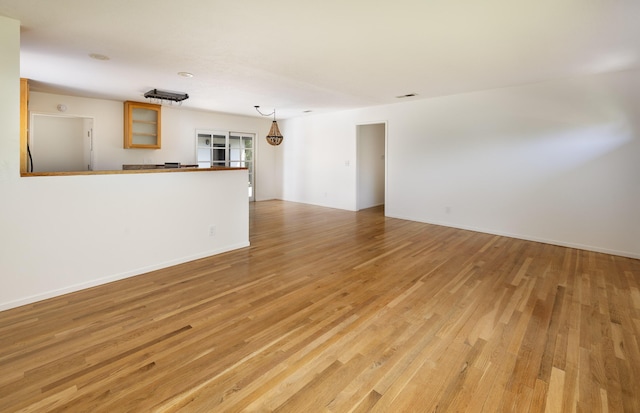 5003 Rhoads Ave, Santa Barbara, CA 93111 - unfurnished living room with light wood-style flooring