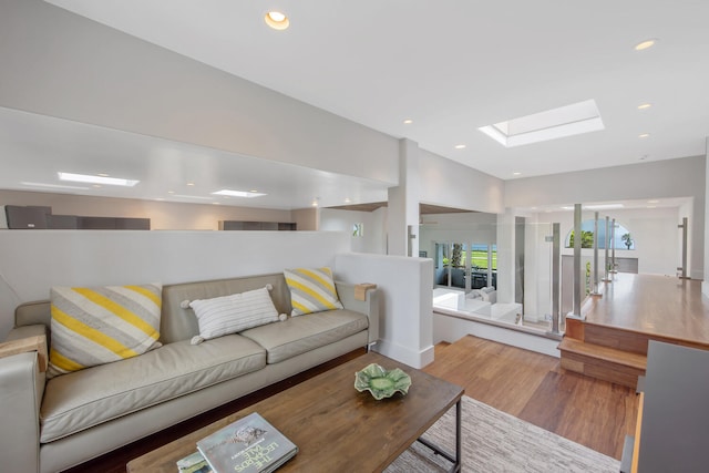 1312 Shoreline Dr, Santa Barbara, CA 93109 - living room with wood finished floors, a skylight, and recessed lighting