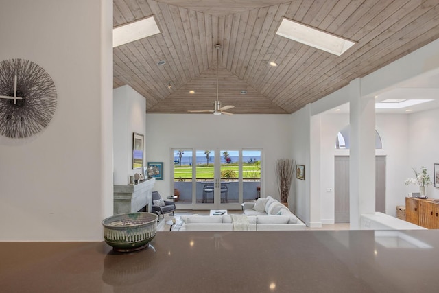 1312 Shoreline Dr, Santa Barbara, CA 93109 - living area featuring a skylight, high vaulted ceiling, and recessed lighting