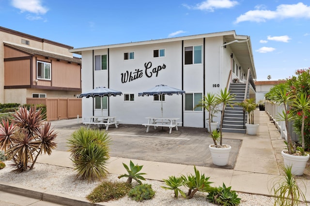 160 Ash Ave, Carpinteria, CA 93013 - back of property with stairs and a patio area