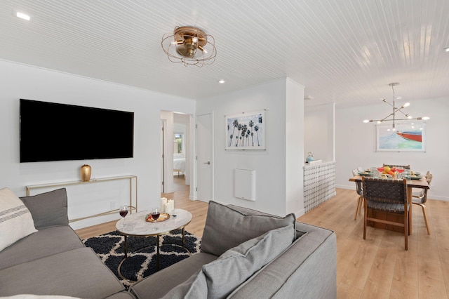 160 Ash Ave, Carpinteria, CA 93013 - living room featuring a chandelier, light wood finished floors, and recessed lighting