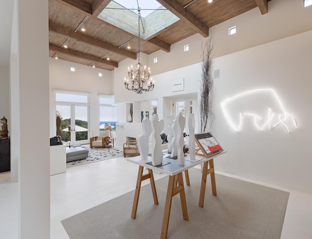 191 E Mountain Dr, Montecito, CA 93108 - dining room with a wooden ceiling with exposed beams, a towering ceiling, french doors, a chandelier, and a skylight