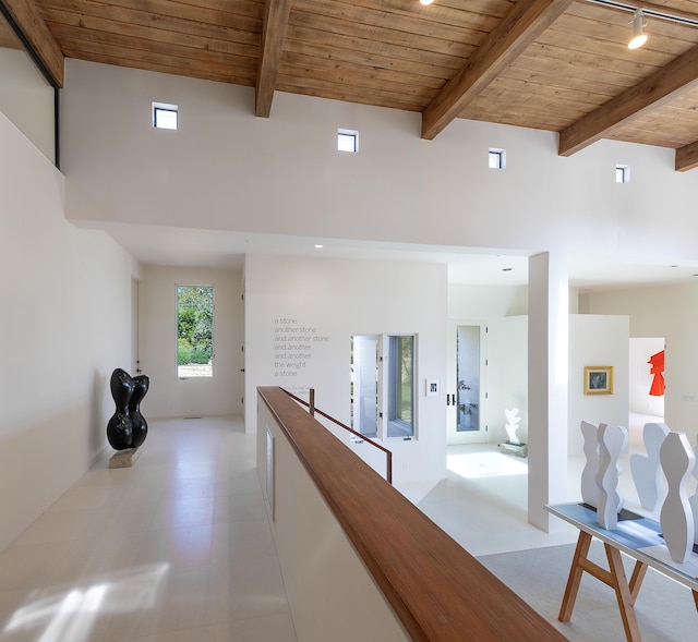 191 E Mountain Dr, Montecito, CA 93108 - corridor featuring a wood ceiling with exposed beams, rail lighting, and a towering ceiling