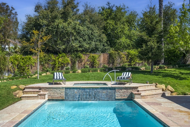 4530 Via Clarice, Santa Barbara, CA 93111 - view of swimming pool featuring an in-ground hot tub, a fenced backyard, and view of wooded area