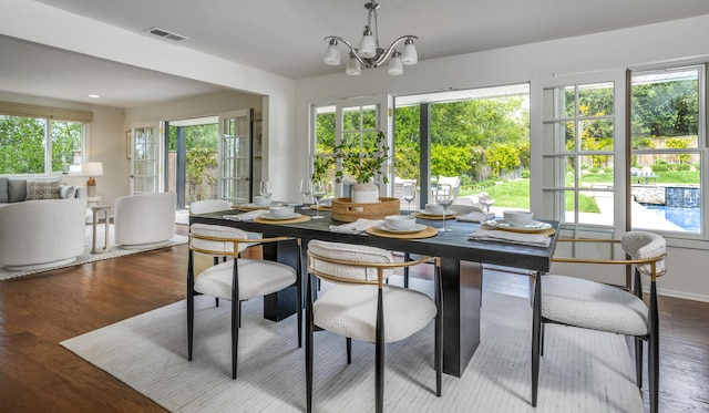4530 Via Clarice, Santa Barbara, CA 93111 - dining area featuring wood finished floors and a chandelier
