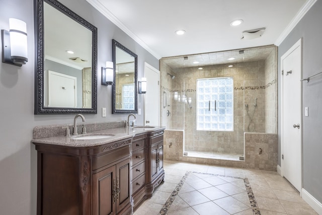 4530 Via Clarice, Santa Barbara, CA 93111 - full bathroom with a stall shower, double vanity, crown molding, inlaid floor details, and recessed lighting