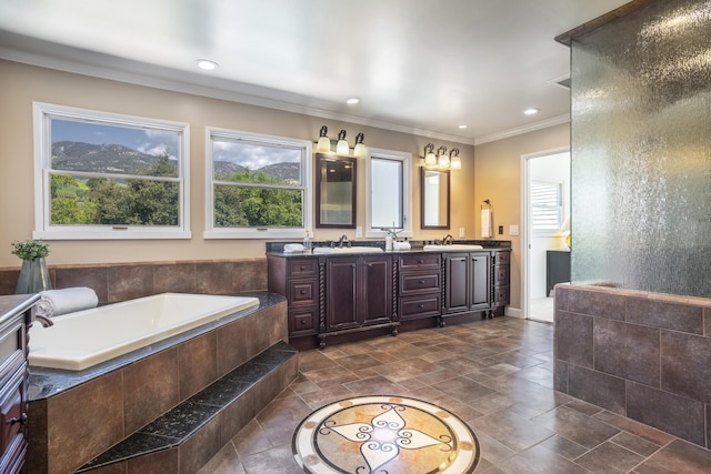 4530 Via Clarice, Santa Barbara, CA 93111 - full bathroom with double vanity, a garden tub, recessed lighting, and crown molding