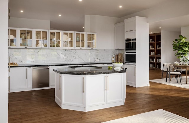4530 Via Clarice, Santa Barbara, CA 93111 - kitchen with white cabinetry, stainless steel appliances, tasteful backsplash, dark wood finished floors, and recessed lighting