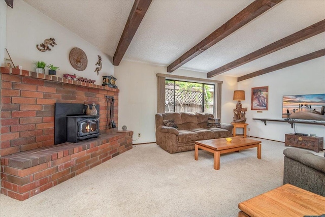 1300 E Airport Ave, Lompoc, CA 93436 - living area featuring carpet, a wood stove, beam ceiling, and a textured ceiling