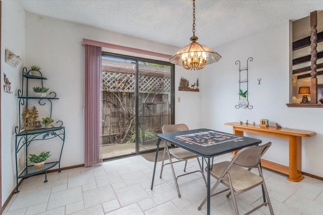 1300 E Airport Ave, Lompoc, CA 93436 - dining room with a chandelier and a textured ceiling
