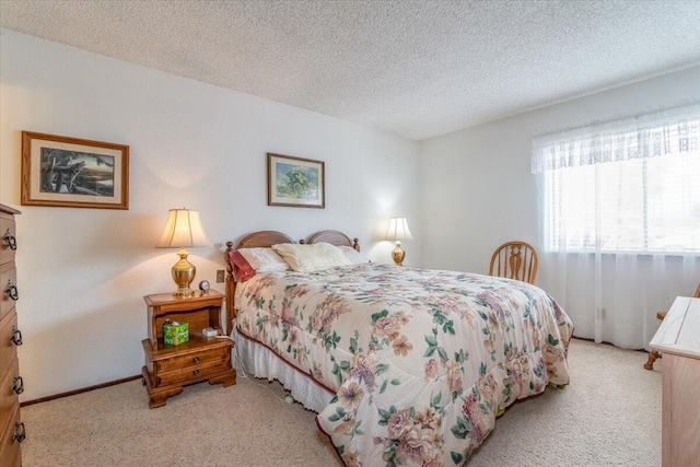 1300 E Airport Ave, Lompoc, CA 93436 - bedroom with light colored carpet and a textured ceiling
