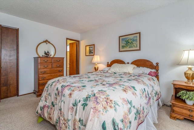 1300 E Airport Ave, Lompoc, CA 93436 - bedroom featuring light carpet and a textured ceiling