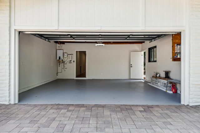1412 Crestline Dr, Santa Barbara, CA 93105 - garage featuring water heater and a garage door opener