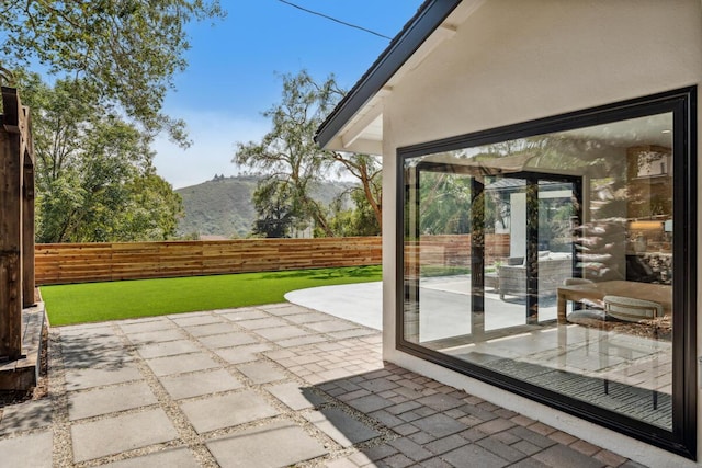 1412 Crestline Dr, Santa Barbara, CA 93105 - fenced backyard featuring a patio and a mountain view