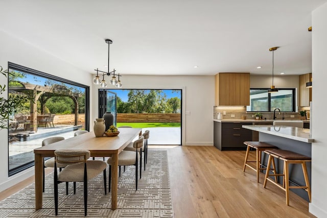 1412 Crestline Dr, Santa Barbara, CA 93105 - dining room with light wood finished floors, recessed lighting, and a chandelier