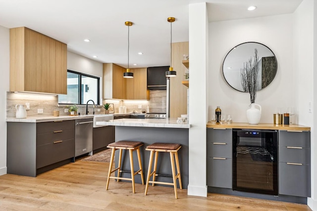 1412 Crestline Dr, Santa Barbara, CA 93105 - kitchen with beverage cooler, modern cabinets, backsplash, and recessed lighting